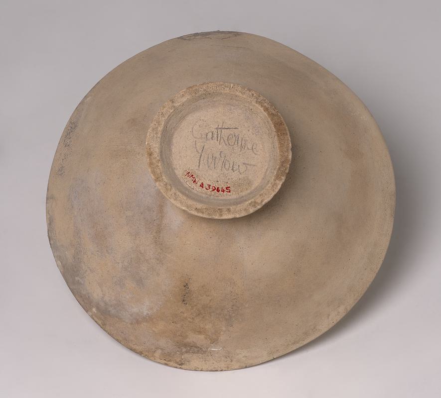 Dish with Incised Face and Birds