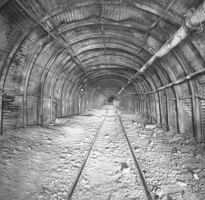 Black and white film negative showing an underground roadway, Oakdale Colliery, May 1980.  'Oakdale May 1980' is transcribed from original negative bag.