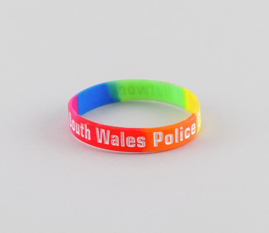Wrist band 'South Wales Police Gay Staff Network'.