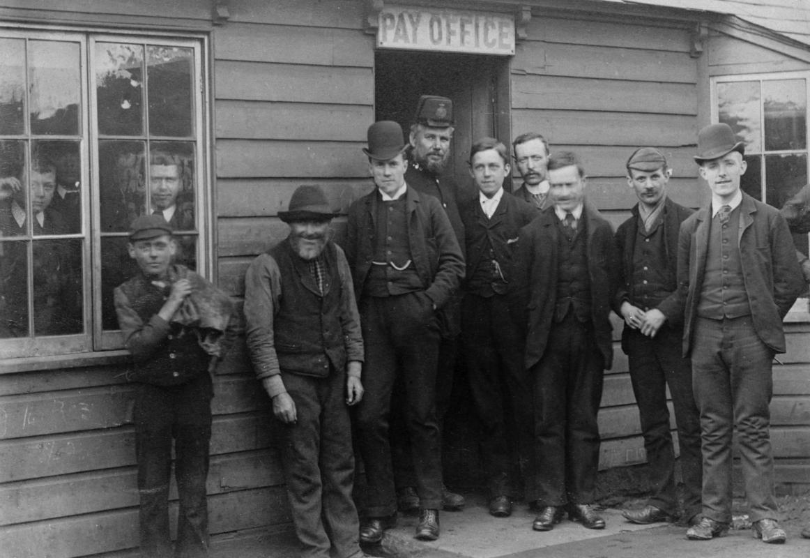 Cambrian Combine Strike 1910 - 1911. Officials and miners outside pay office.