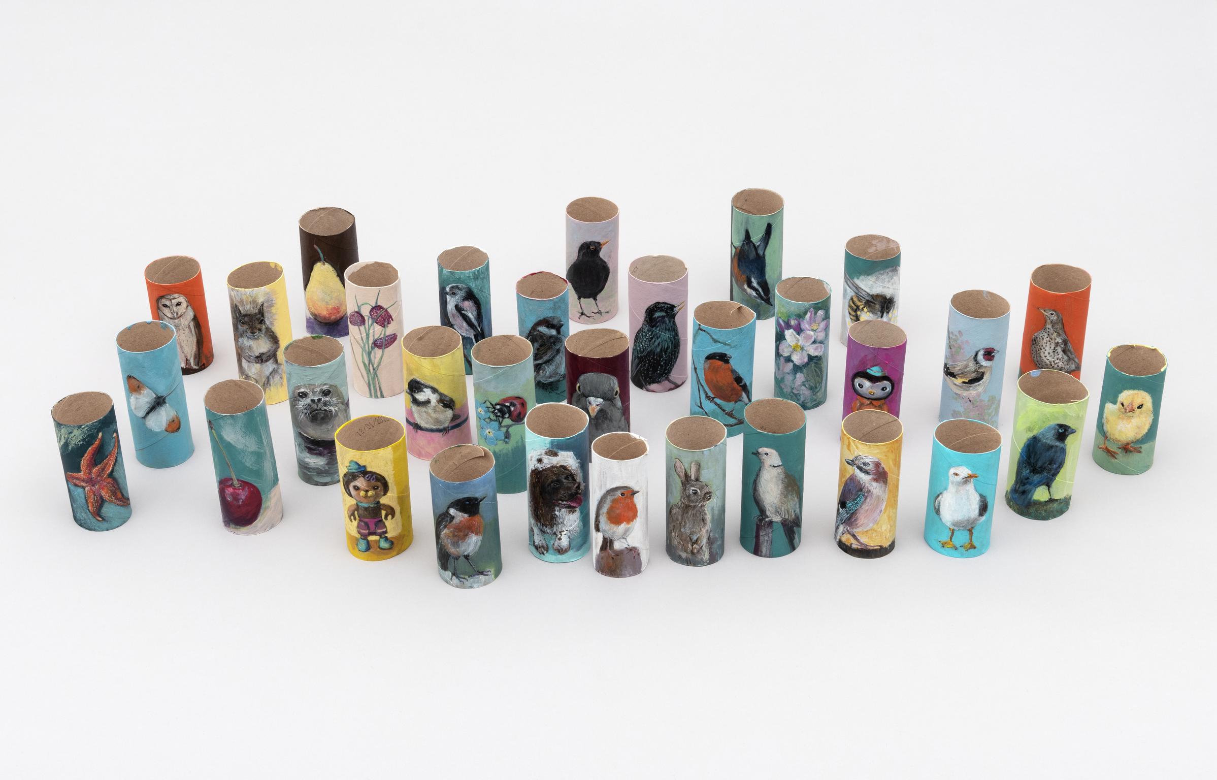 Group shot of Handpainted toilet roll by Carys Evans