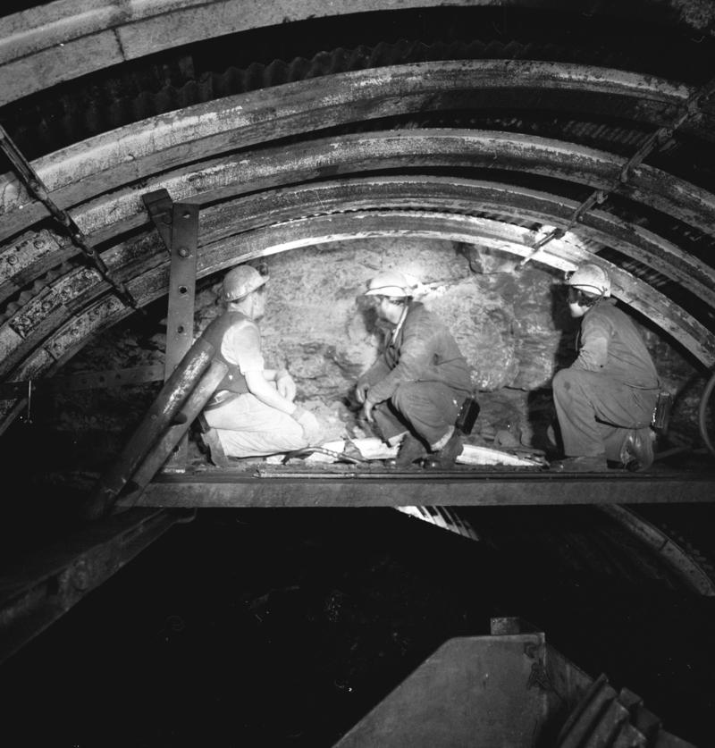 Black and white film negative showing a repair gang at work, Oakdale Colliery, May 1980.  'Oakdale May 1980' is transcribed from original negative bag.