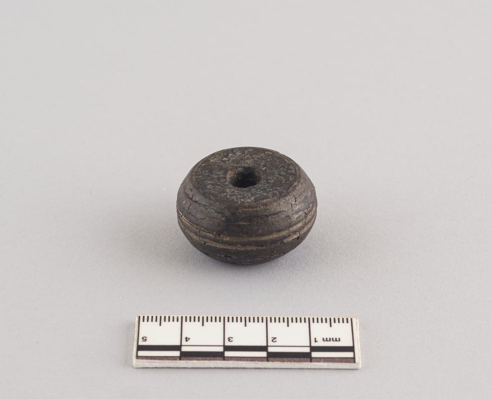 Roman shale spindle whorl