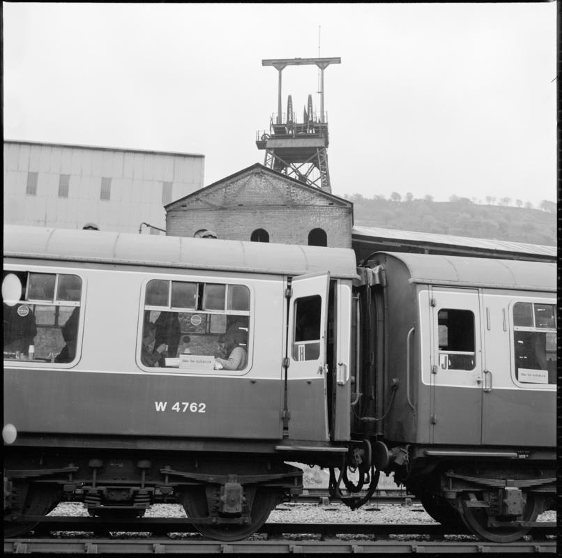 Black and white film negative showing locomotive carriages at Abertillery New Mine, 1977. '1977' is transcribed from original negative bag.  Appears to be identical to 2009.3/2331.