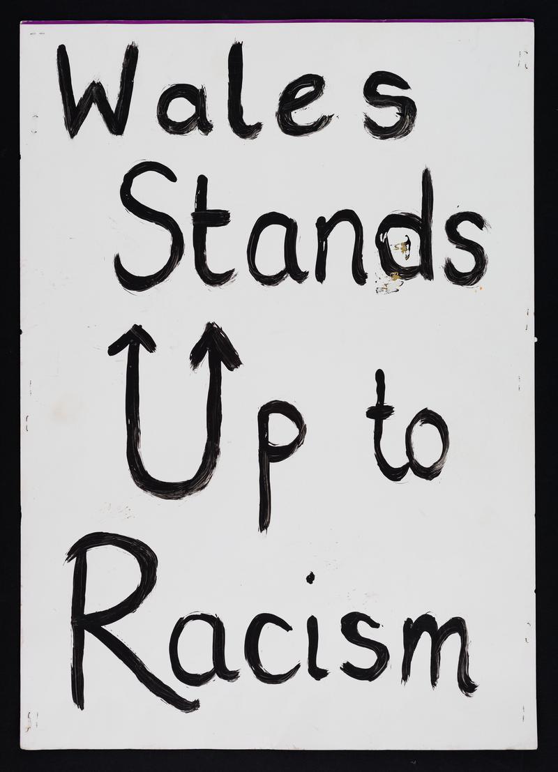 Wales Stands Up to Racism' placard used at the Women's March in Cardiff city centre on 21 January 2017 (obverse)