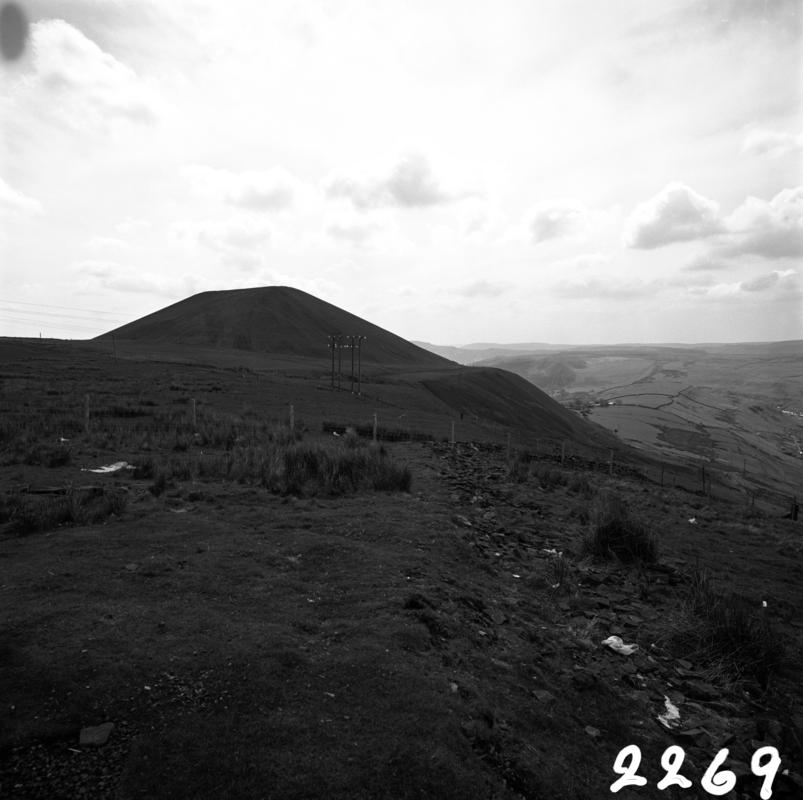Black and white film negative showing a view of the landscape surrounding Maerdy Colliery.