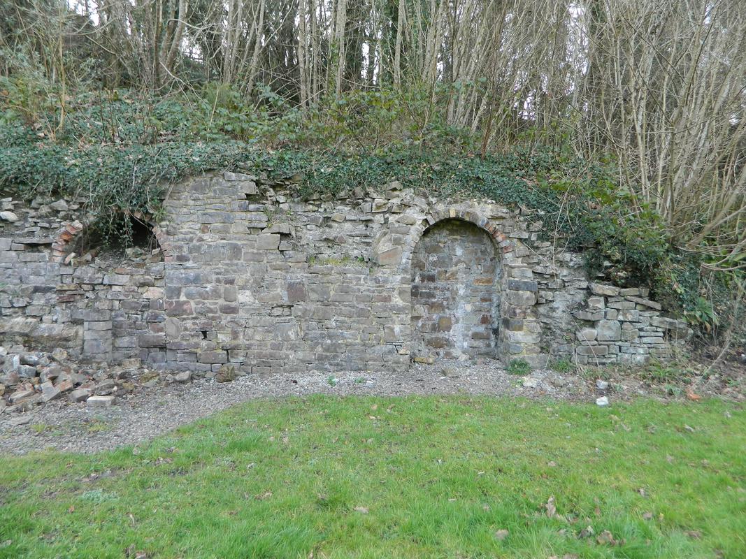 Kilgetty Ironworks, Stepaside: panorama (joins with 29) of ruinous front elevation of block of beehive coke ovens, viewed from east: right hand half of panorama.