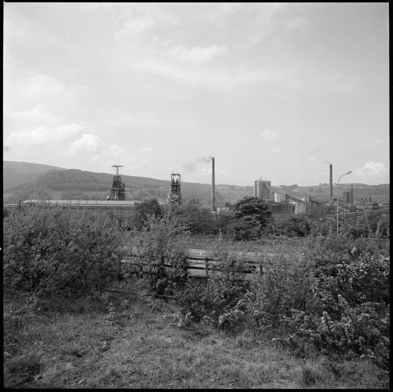 Black and white film negative showing a view towards Nantgarw Colliery.  'Nantgarw' is transcribed from original negative bag.
