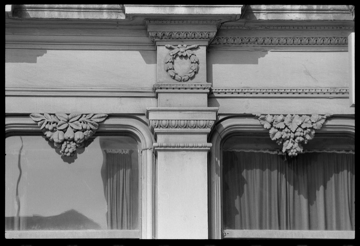 Decoration above windows of Docks Non-Political Club, Bute Street.