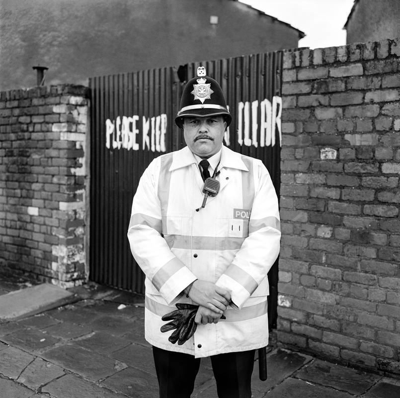 P.C. Richie Paines. Photo shot: Grangetown, Cardiff 4th February 2001. Place and date of birth: Cardiff 1956. Main occupation: Police Constable, Minority Support Unit. First Language: English. Other languages: None. Lived in Wales: Always.