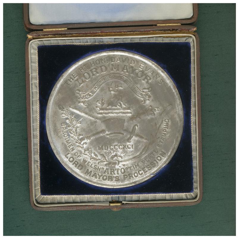 Commemorative medal. A specimen of Welsh "ARTO" tin plate stamping (obverse)