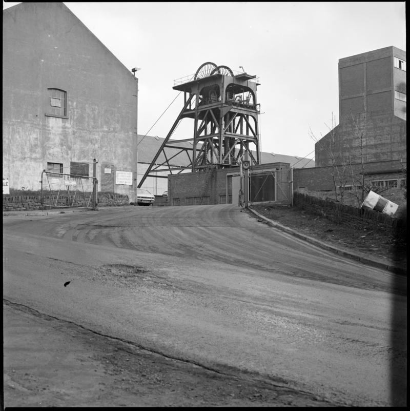 Black and white film negative showing the downcast headframe, Cwm Colliery 3 April 1981.  'Cwm 3 April 1981' is transcribed from original negative bag.