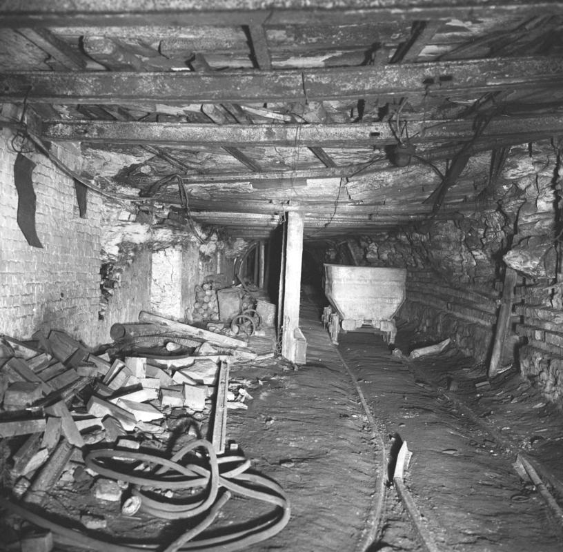 Black and white film negative showing an underground view of Oakdale Colliery, May 1980.  'Oakdale May 1980' is transcribed from original negative bag.