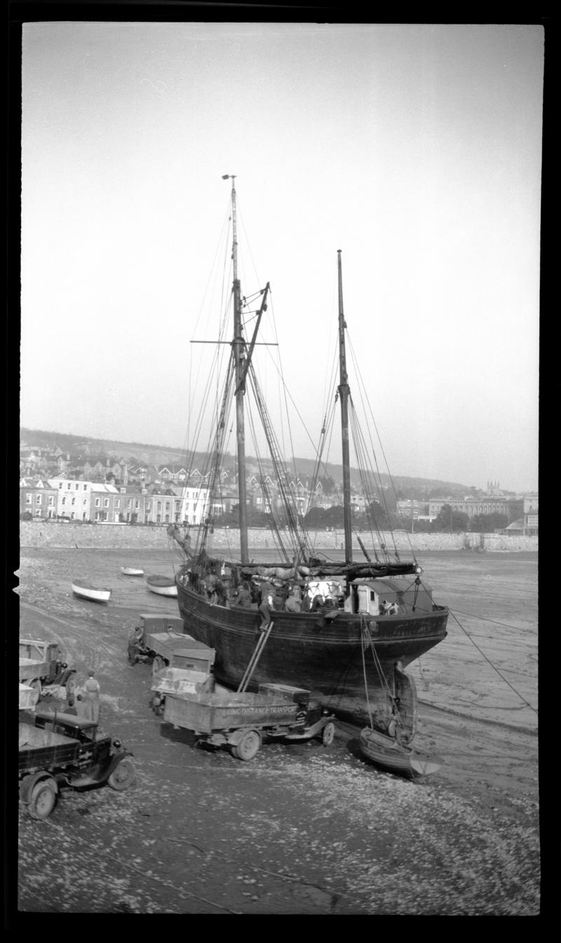 Stern view of Barnstable ketch C.F.H. discharging overside at Knightstone, 11th March 1933.