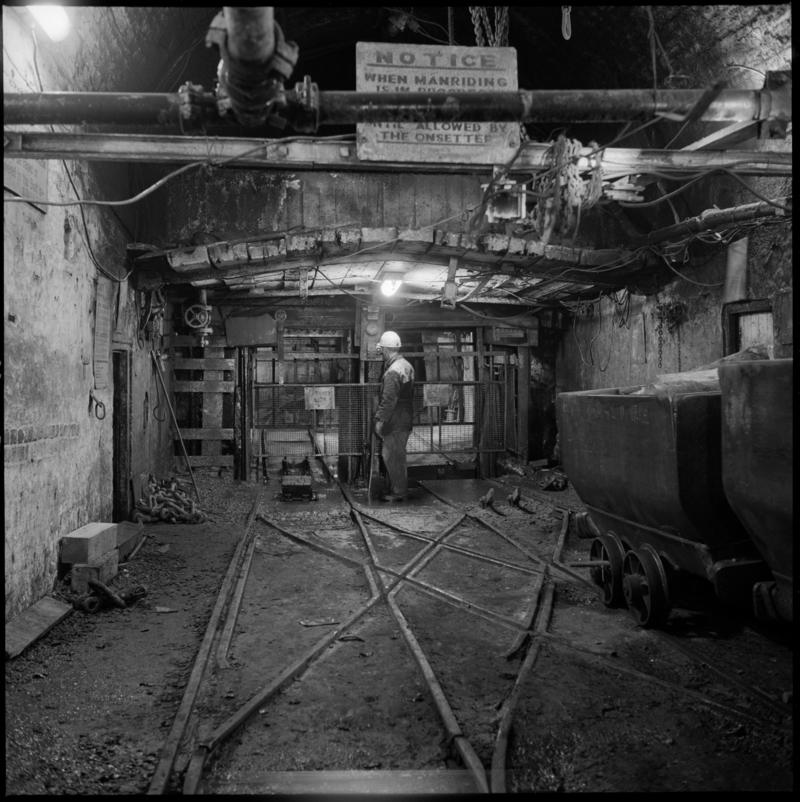 Black and white film negative showing pit bottom at Cwmtillery Colliery 22 November 1977.  'Cwmtillery, 22 November 1977' is transcribed from original negative bag.  Appears to be identical to 2009.3/61.