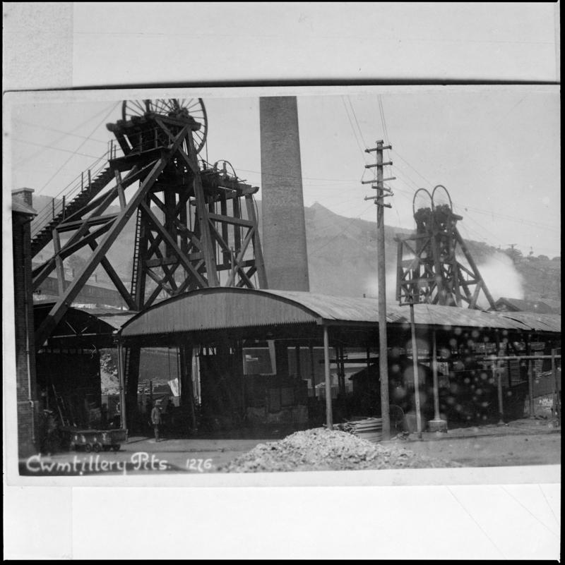 Black and white film negative of a photograph showing the wooden headframes at Cwmtillery Colliery c.1910.  'Cwmtillery' is transcribed from original negative bag.