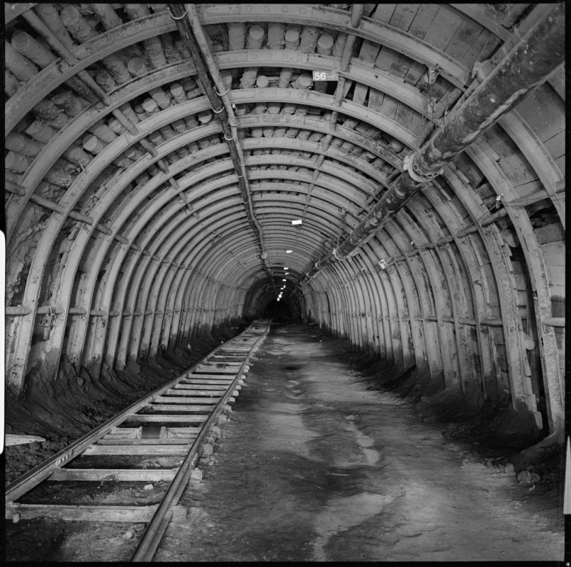 Black and white film negative showing an underground roadway, Blaenserchan Colliery 1978-9.  'Blaenserchan 1978-9' is transcribed from original negative bag.