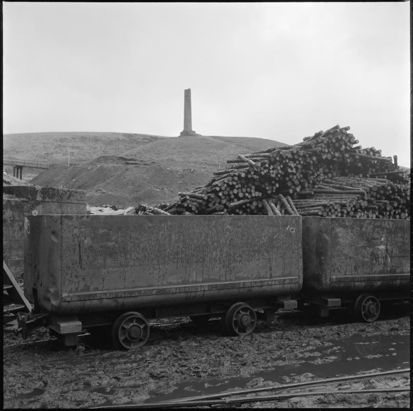 Black and white film negative showing mine cars in Maerdy Colliery yard.  'Mardy' is transcribed from original negative bag.