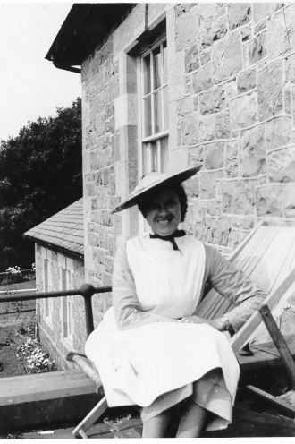 Dinorwig Quarry Hospital. Nancy (Griffith and Marie Therese Hughes' maid) sitting on the balcony at DQH.
