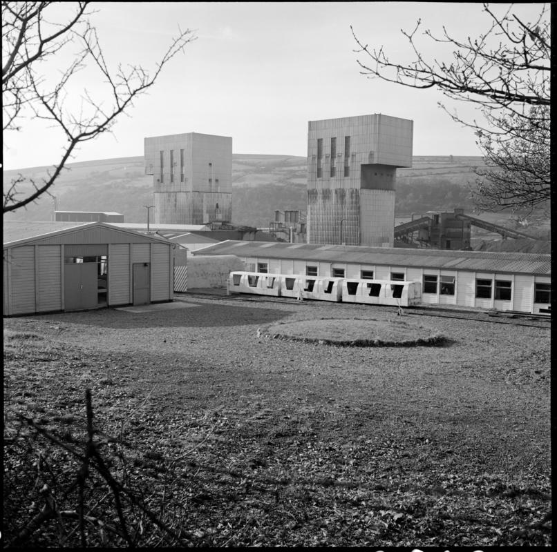 Black and white film negative showing a surface view of Abernant Colliery, 1980.  'Abernant' is transcribed from original negative bag.