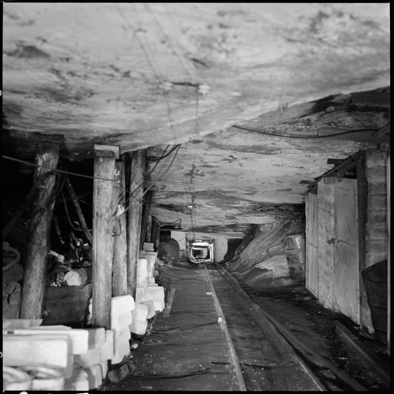 Black and white film negative showing an underground roadway, Morlais Colliery.  'Morlais' is transcribed from original negative bag.