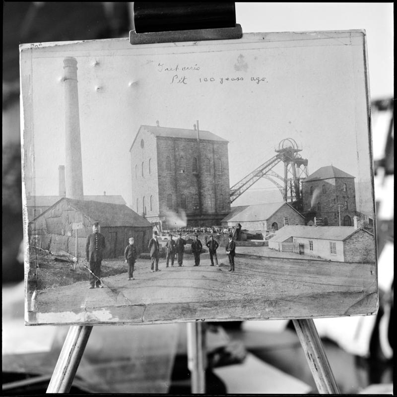 Film negative of a photograph showing a general surface view of Deep Navigation Colliery, 1878.  The engine house housed the vertical winder.  The figure on the left is the colliery policeman  'Deep Navigation' is transcribed from original negative bag.  Appears to be identical to 2009.3/1215.