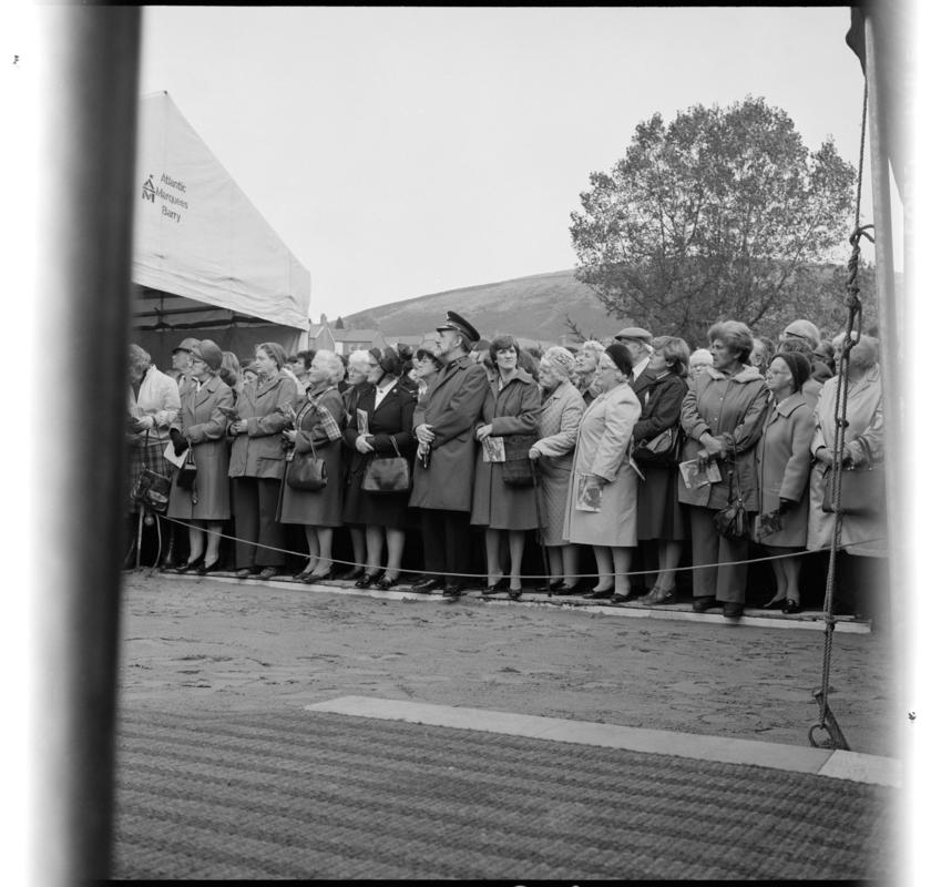Black and white film negative showing the unveiling ceremony of the Senghenydd memorial, commemorating the 1913 Universal Colliery explosion.  The negative is undated but the unveiling ceremony took place in October 1981.  'Senghenydd' is transcribed from original negative bag.