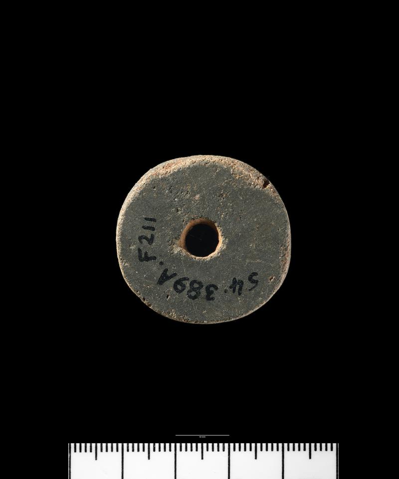 Roman pottery spindle whorl