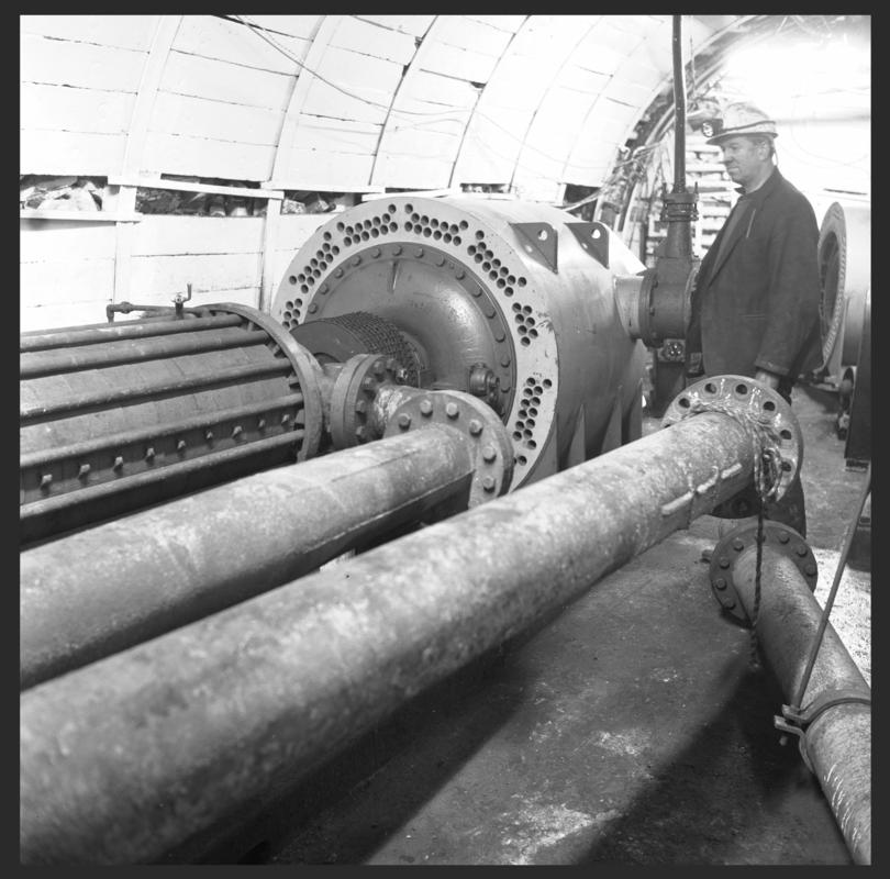 Black and white film negative showing a pumping station, Rose Heyworth Colliery.