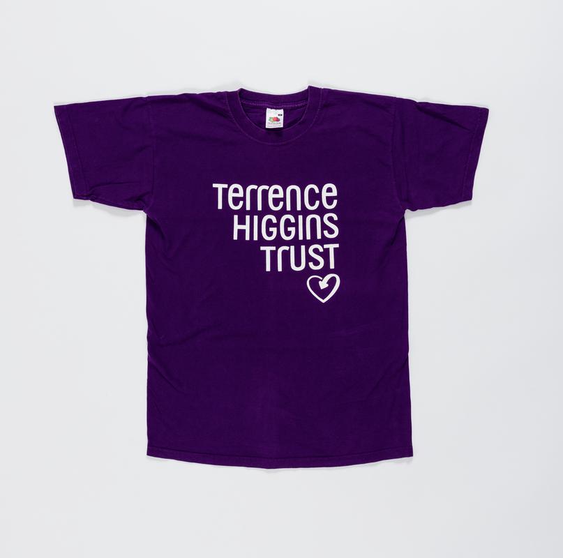 Dark purple t-shirt with 'Terrence Higgins Trust' logo on the front.