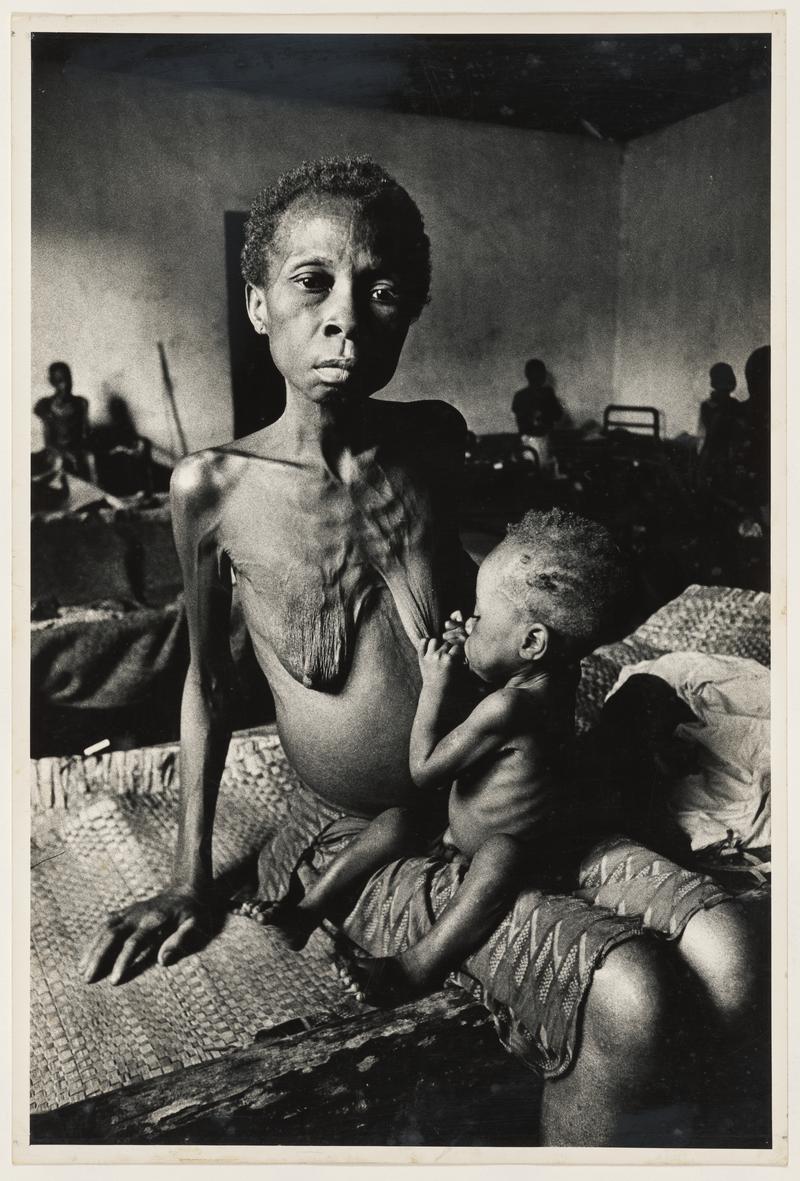 Starving twenty-four year old mother with child, Biafra