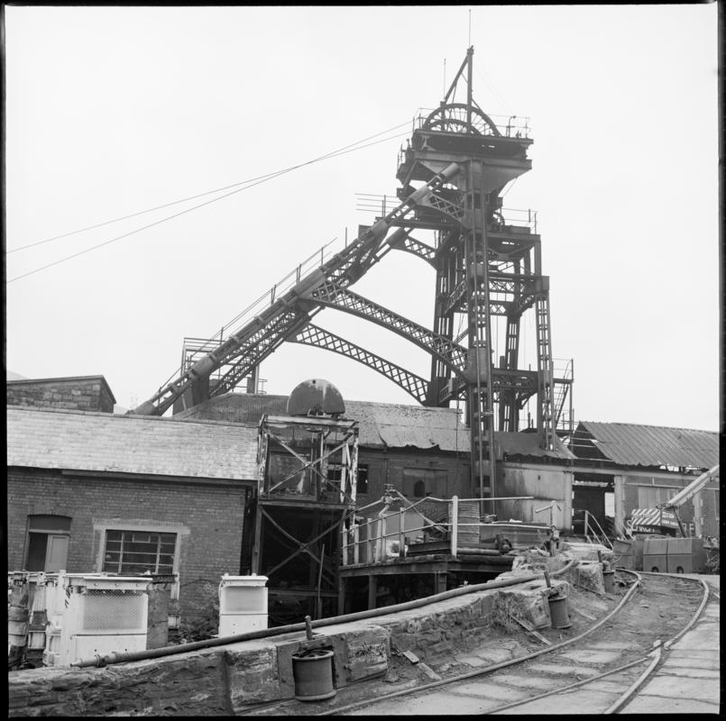 Black and white film negative showing a view of the headframe, Deep Duffryn Colliery 1974. 'Deep Duffryn 1974' is transcribed from original negative bag.