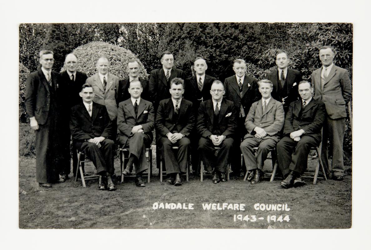 Group photograph of the Oakdale Welfare Council, 1943-1944. Albert Morgan is 2nd from right in the bottom row.