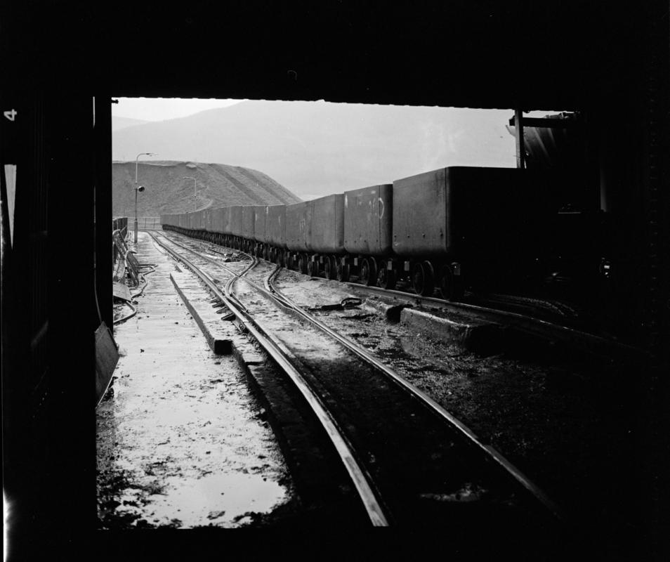 Black and white film negative showing drams on the surface, Aberpergwm Colliery 1978.  'Aberpergwm 1978' is transcribed from original negative bag.