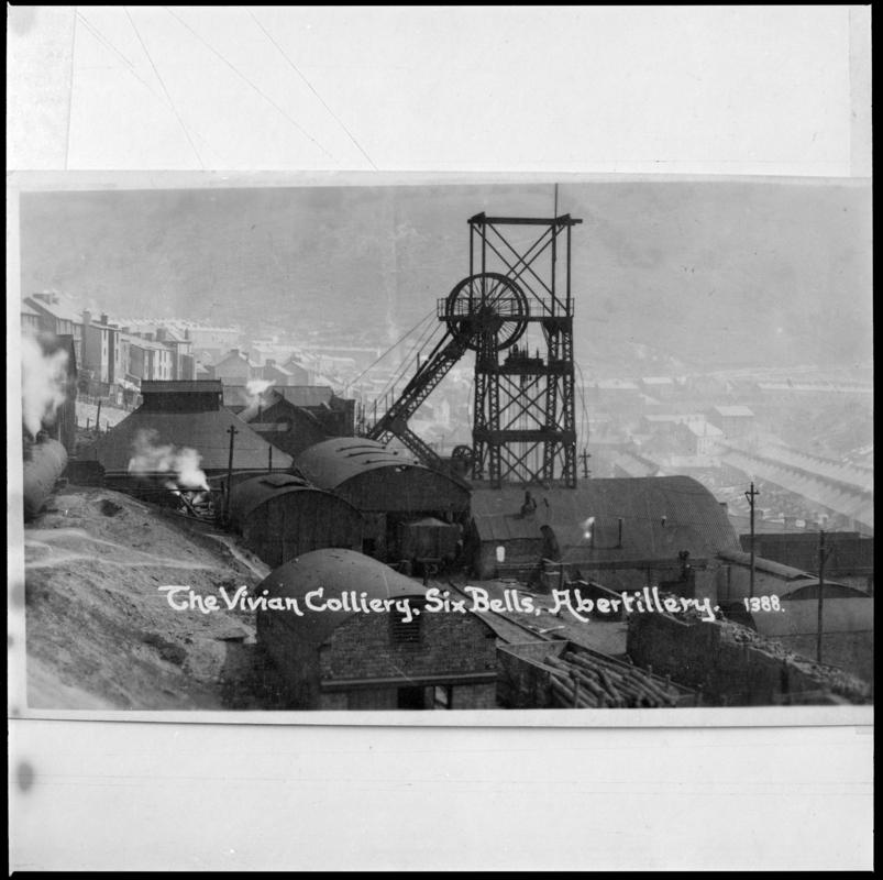 Black and white film negative of a photograph showing a surface view of Vivian Colliery, Six Bells, Abertillery. 'Vivian Colliery' is transcribed from original negative bag.