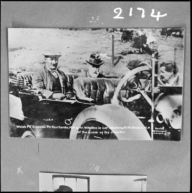 Black and white film negative of a photograph showing 'Mr Keir Hardie M.P and Mr Winston in a car speaking to Mr Brace M.P at the scene of the disaster' (information taken from caption on the photograph), Universal Colliery 1913.  'Sen 1913' is transcribed from original negative bag.