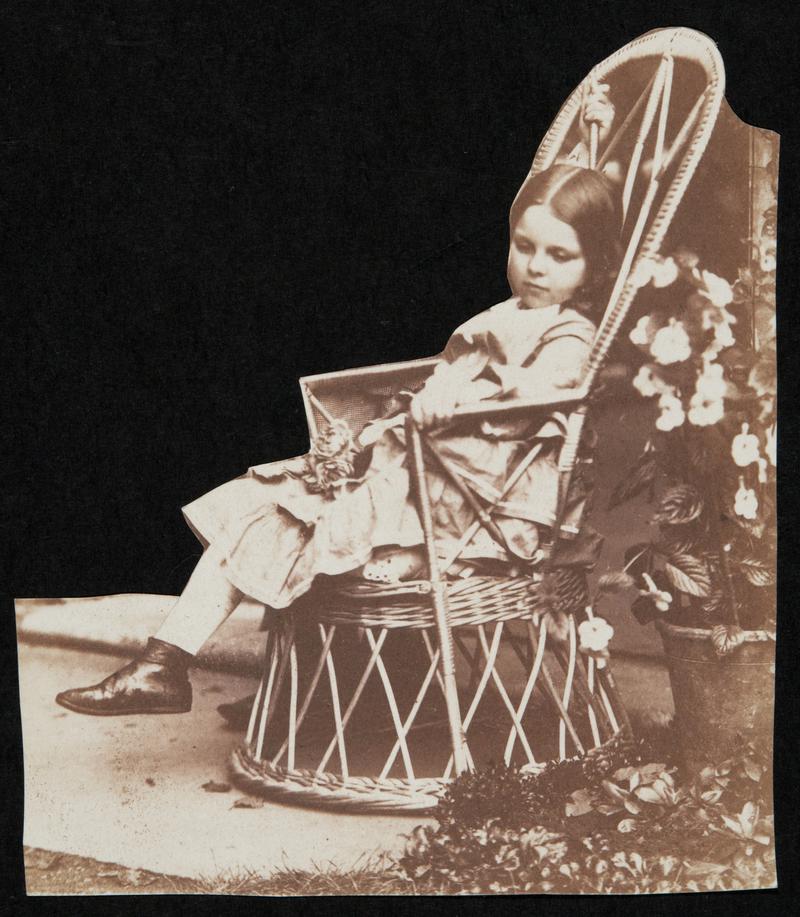 Ellen Toogood seated in a wicker chair