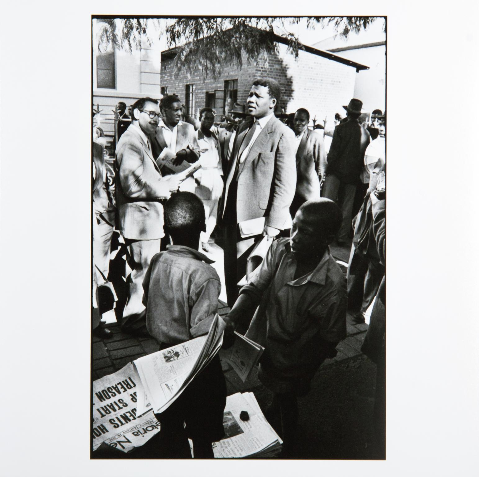 Nelson Mandela, then acting as a defense lawyer, outside the Drill Hall, during the Treason Trial