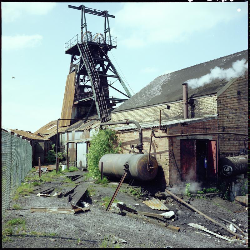 Colour film negative showing a view of the headgear and engine house, Morlais Colliery 13 May 1981.  'Morlais 13/5/81' is transcribed from original negative bag.