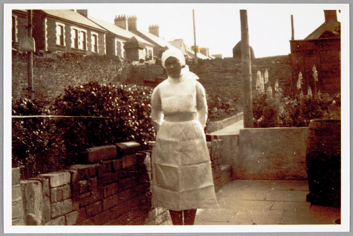 Mrs Gertrude Morgan (nee Davies) in nursing uniform, c. 1930s. Trained in London, Mrs Morgan later became a midwife at Morriston Hospital. Her midwife's uniform and certificates in collection (F2013.14)