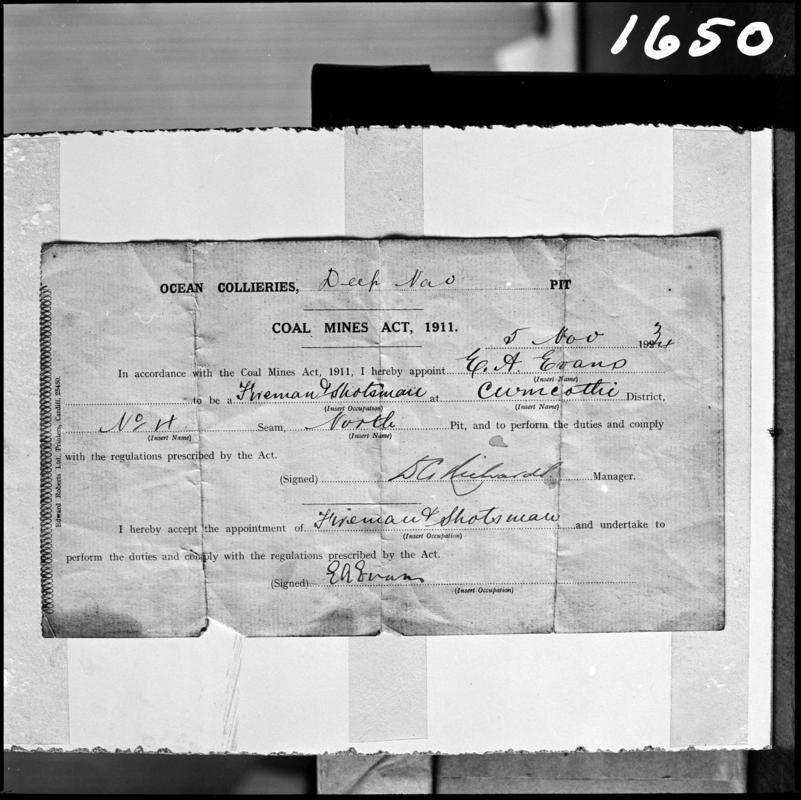 Black and white film negative showing a document comfirming the appointment of E.A. Evans as a fireman & shotsman at Deep Navigation Colliery, 5 Nov 1934 in accordance with the Coal Mines Act 1911.