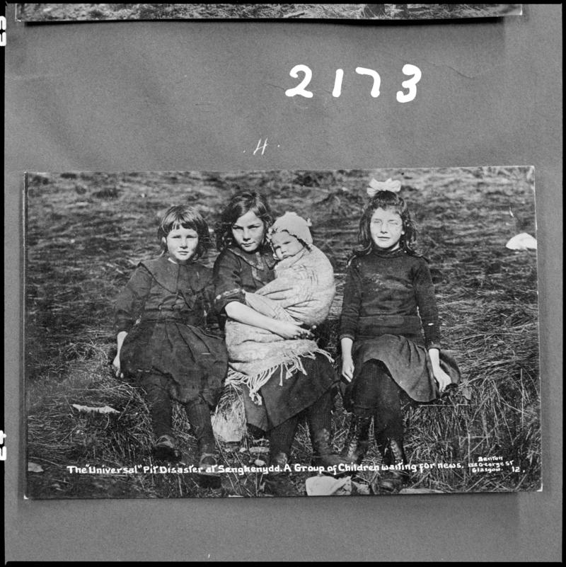 Black and white film negative of a photograph showing children waiting for news following the Universal Colliery disaster of 14 October 1913.  'Sen 1913' is transcribed from original negative bag.