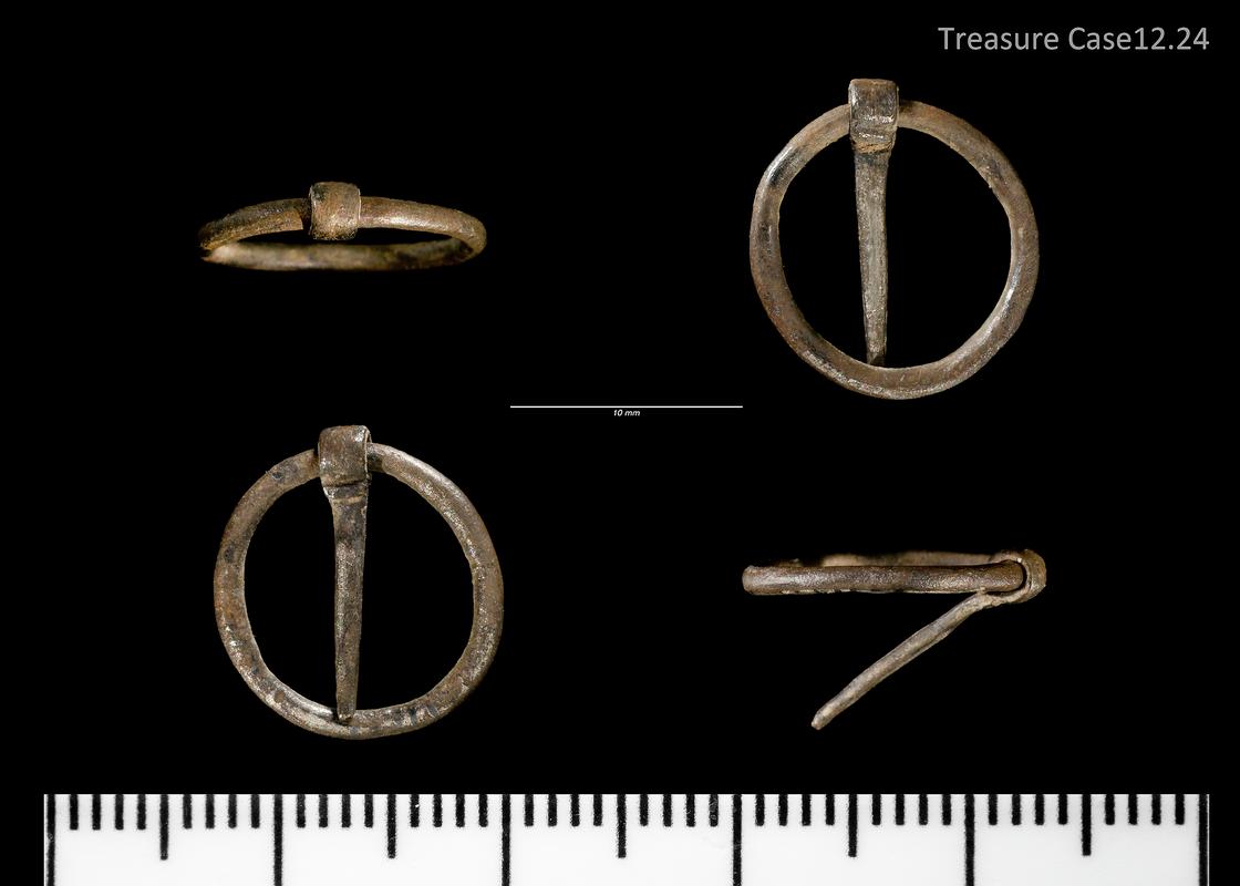 silver annular brooch