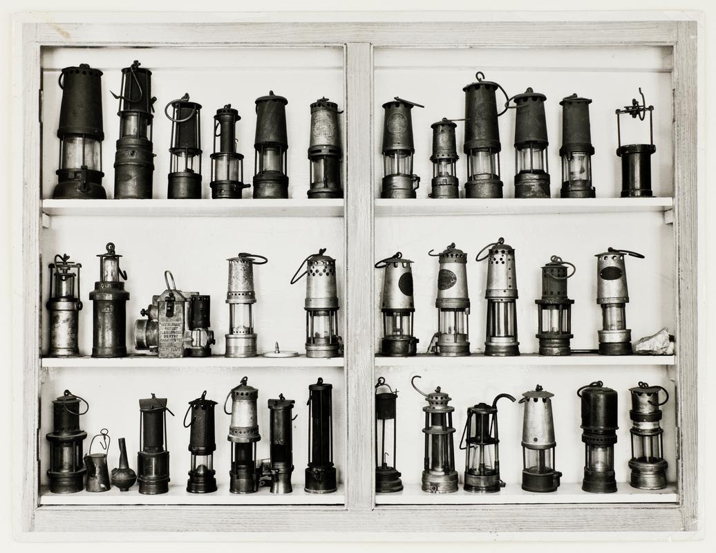 Cabinet full of miners' safety lamps