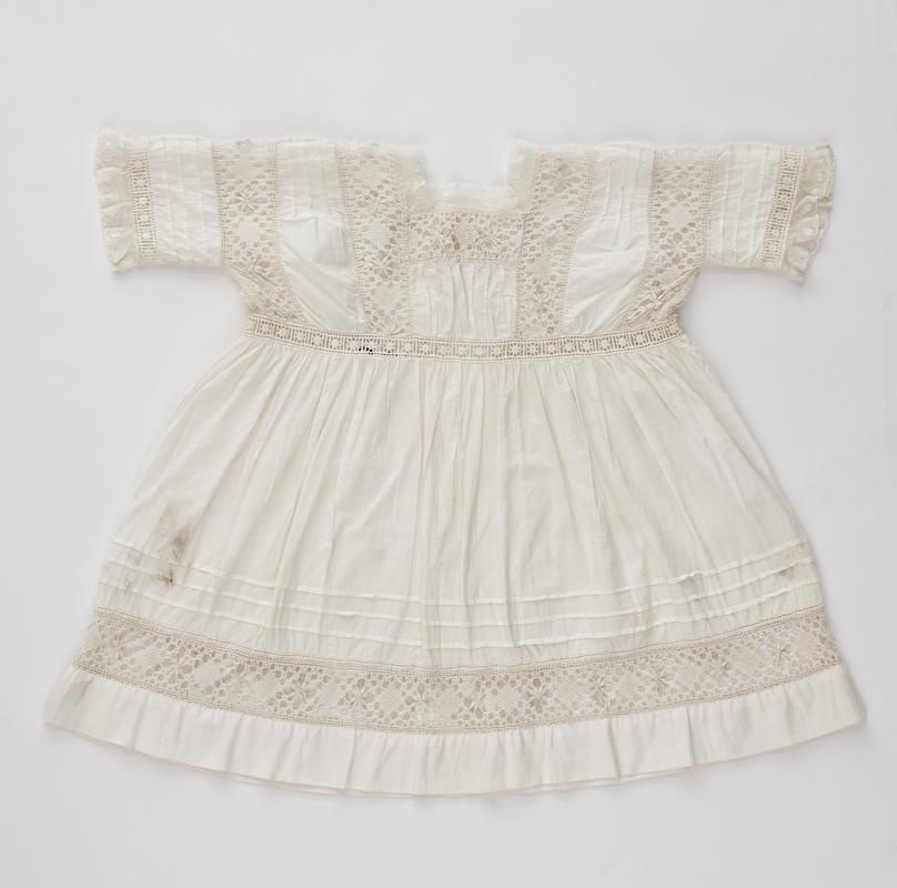 Baby's white cotton lawn frock with high waistline