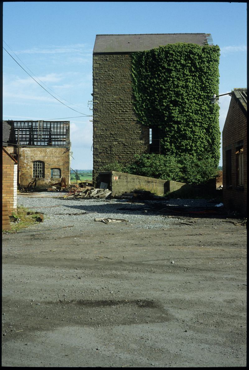 Colour film slide showing derelict colliery buildings,  Morlais Colliery, 4 September 1982.