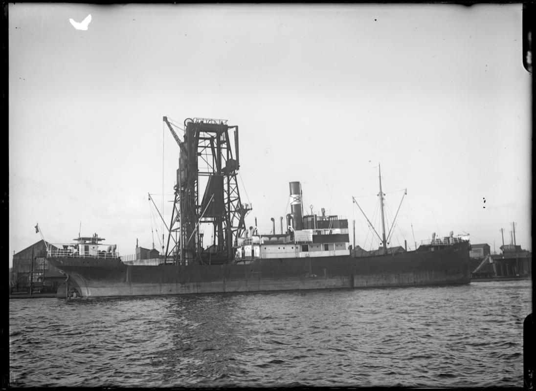 Starboard broadside view of S.S. ELNA E at Cardiff Docks, c.1936.