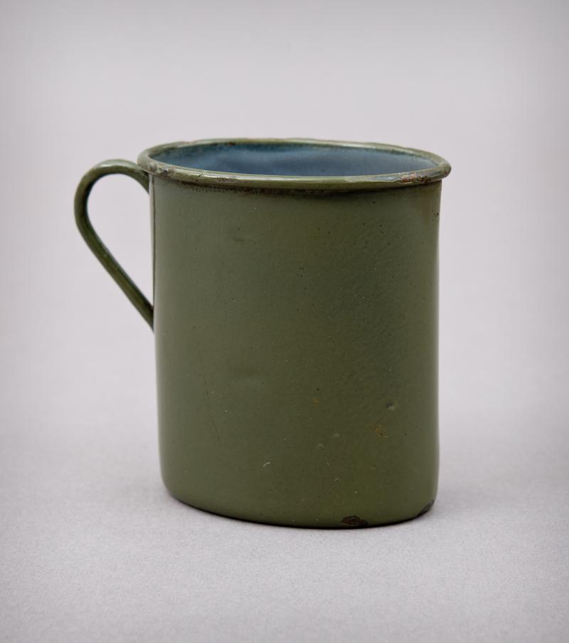 Tin mug. Stamped on base 'Wupperman 17'. Belonged to a German Tank Commander.
