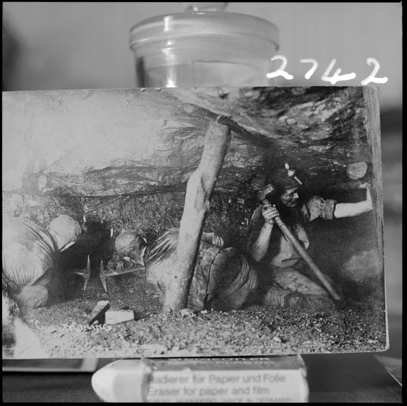 Black and white film negative of a photograph showing men at work, Rhondda Level c.1900.  'Rhondda Level' is transcribed from original negative bag.  Appears to be identical to 2009.3/2221.