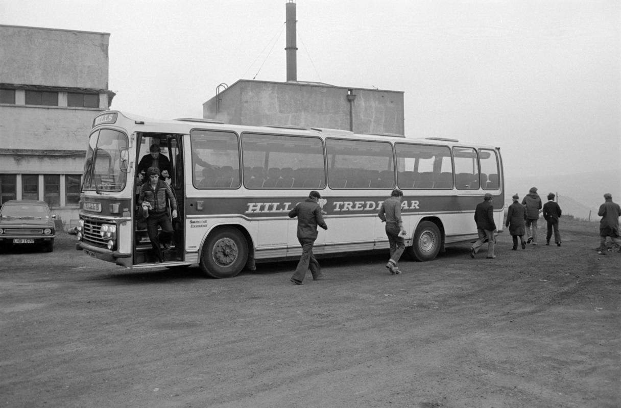 Miners arriving at Big Pit Colliery on board a 'Hills of Tredegar' bus.